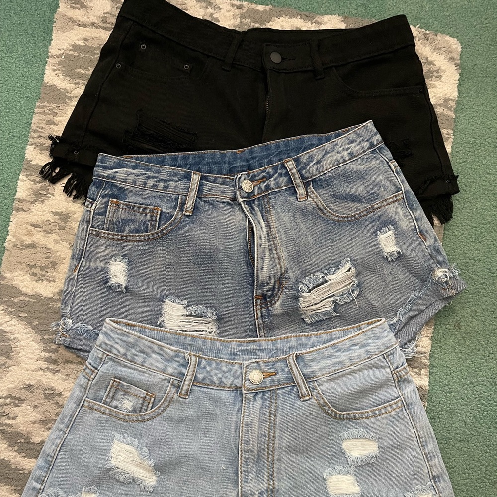 3 pairs of shorts. ALL size MEDIUM. Never worn.